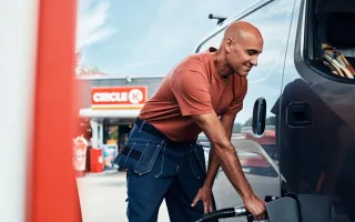Man fueling his truck
